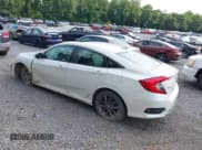 ✅ 2021 Honda Civic EX-L • VIN: 19XFC1F77ME202164 • Lot: 42727770. Listed on IAAI with 61,699 mi. Free auction sales archive from the USA and detailed vehicle history report at DreamBid. Image 3.