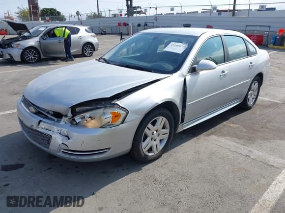 ✅ 2014 Chevrolet Impala LT • VIN: 2G1WB5E31E1100066 • Lot: 42240075. Listed on IAAI with 175,209 mi. Free auction sales archive from the USA and detailed vehicle history report at DreamBid. Image 17.