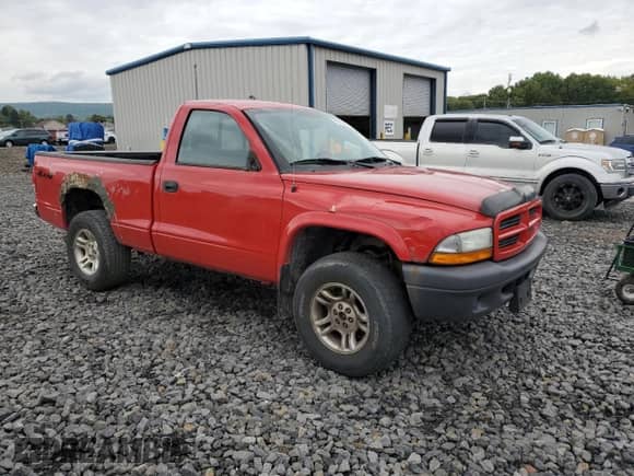 2003 Dodge Dakota with VIN 1D7GG16X33S296165, listed as a Copart auction lot 71813065 with 136,772 mi miles and Salvage title. Bid and sale history available at DreamBid. Image 4.