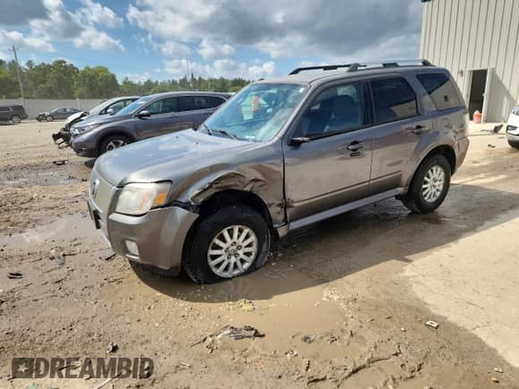 2010 Mercury Mariner Premier с VIN 4M2CN9HG9AKJ15491, выставлен на аукционе Copart как лот 70665985 с пробегом 198 092 миль миль и На запчасти • Non repairable. История ставок и продаж доступна на DreamBid. Изображение 1.