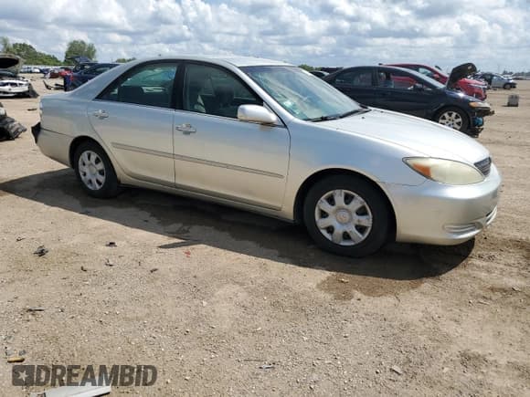 ✅ 2002 Toyota Camry LE • VIN: 4T1BE32K32U087099 • Lot: 62587675. Listed on Copart with 238,376 mi. Free auction sales archive from the USA and detailed vehicle history report at DreamBid. Image 4.