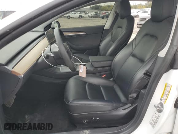 ✅ 2021 Tesla Model 3 Standard Range Plus • VIN: 5YJ3E1EA5MF063527 • Лот: 80827995. Опубликован ранее на Copart с пробегом 79 667 миль. Бесплатный доступ к архиву аукционных продаж из США и подробный отчёт об истории автомобиля на DreamBid. Изображение 7.