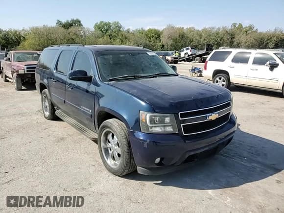 ✅ 2007 Chevrolet Suburban LT • VIN: 1GNFC16097J183781 • Lot: 76099354. Wystawiony na Copart z przebiegiem 279 845 mil. Bezpłatny archiwum sprzedaży aukcyjnych z USA i szczegółowy raport historii pojazdu na DreamBid. Zdjęcie 12.