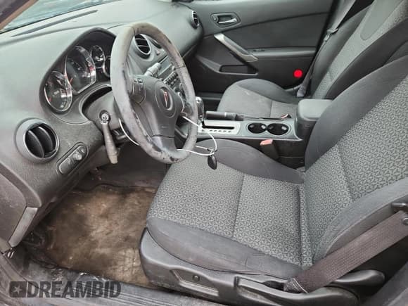 ✅ 2009 Pontiac G6 1SA • VIN: 1G2ZG57N294178780 • Lot: 61908955. Wystawiony na Copart z przebiegiem 124 238 mil. Bezpłatny archiwum sprzedaży aukcyjnych z USA i szczegółowy raport historii pojazdu na DreamBid. Zdjęcie 7.