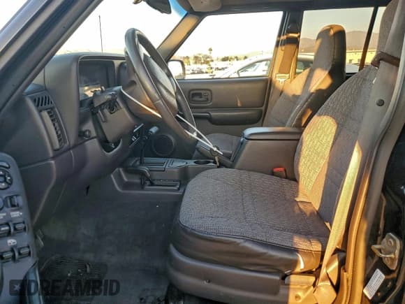 ✅ 2001 Jeep Cherokee Sport • VIN: 1J4FF48S51L596481 • Lot: 94193505. Listed on Copart with 127,415 mi. Free auction sales archive from the USA and detailed vehicle history report at DreamBid. Image 7.
