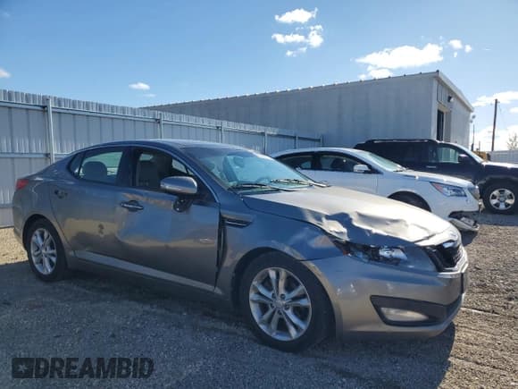✅ 2013 Kia Optima EX • VIN: 5XXGN4A71DG209884 • Lot: 92099775. Wystawiony na Copart z przebiegiem 169 018 mil. Bezpłatny archiwum sprzedaży aukcyjnych z USA i szczegółowy raport historii pojazdu na DreamBid. Zdjęcie 4.