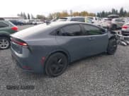 ✅ 2023 Toyota Prius LE • VIN: JTDACAAU6P3004985 • Lot: 43451191. Wystawiony na IAAI z przebiegiem 29 165 mil. Bezpłatny archiwum sprzedaży aukcyjnych z USA i szczegółowy raport historii pojazdu na DreamBid. Zdjęcie 4.