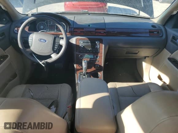 ✅ 2009 Ford Taurus SEL • VIN: 1FAHP24W29G108378 • Lot: 81757405. Wystawiony na Copart z przebiegiem 208 251 mil. Bezpłatny archiwum sprzedaży aukcyjnych z USA i szczegółowy raport historii pojazdu na DreamBid. Zdjęcie 8.