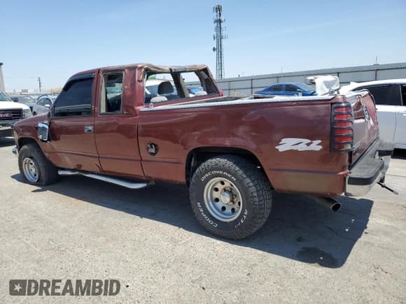 ✅ 1998 GMC Sierra 1500 • VIN: 1GTEK19R1WR511373 • Лот: 60080685. Опубликован ранее на Copart с пробегом 178 199 миль. Бесплатный доступ к архиву аукционных продаж из США и подробный отчёт об истории автомобиля на DreamBid. Изображение 2.