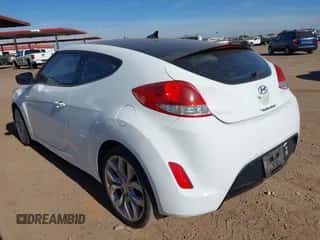 2013 Hyundai Veloster w/Black Int с VIN KMHTC6AD3DU157752, выставлен на аукционе IAAI как лот 43498644 с пробегом 235 559 миль миль и . История ставок и продаж доступна на DreamBid. Изображение 3.