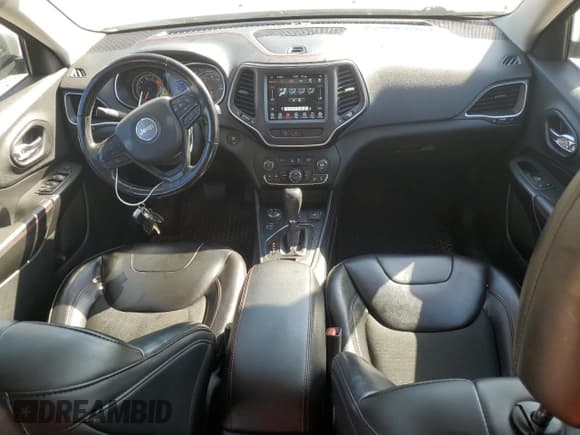 ✅ 2020 Jeep Cherokee Trailhawk • VIN: 1C4PJMBXXLD613253 • Лот: 84059255. Опубликован ранее на Copart с пробегом 65 117 миль. Бесплатный доступ к архиву аукционных продаж из США и подробный отчёт об истории автомобиля на DreamBid. Изображение 8.