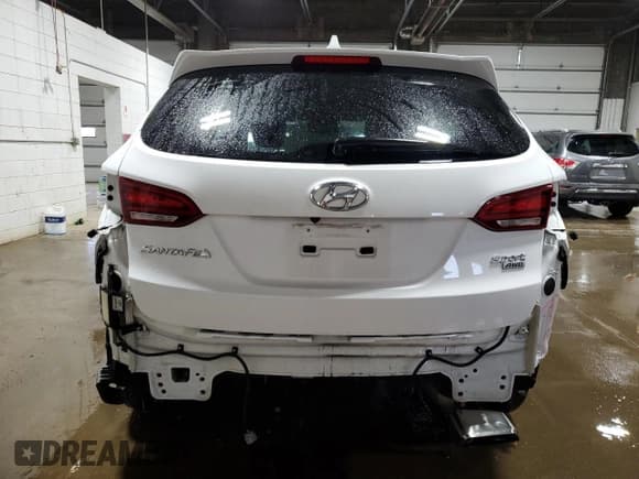 ✅ 2018 Hyundai Santa Fe 2.4L • VIN: 5NMZUDLBXJH099816 • Лот: 51922764. Опубликован ранее на Copart с пробегом 57 229 миль. Бесплатный доступ к архиву аукционных продаж из США и подробный отчёт об истории автомобиля на DreamBid. Изображение 6.
