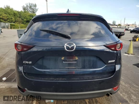 ✅ 2018 Mazda CX-5 Touring • VIN: JM3KFACM6J1448886 • Lot: 91935085. Wystawiony na Copart z przebiegiem 102 177 mil. Bezpłatny archiwum sprzedaży aukcyjnych z USA i szczegółowy raport historii pojazdu na DreamBid. Zdjęcie 6.