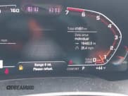 ✅ 2022 BMW 8 Series M850i • VIN: WBAGV8C05NCG97441 • Лот: 43766158. Опубликован ранее на IAAI с пробегом 41 651 миль. Бесплатный доступ к архиву аукционных продаж из США и подробный отчёт об истории автомобиля на DreamBid. Изображение 15.