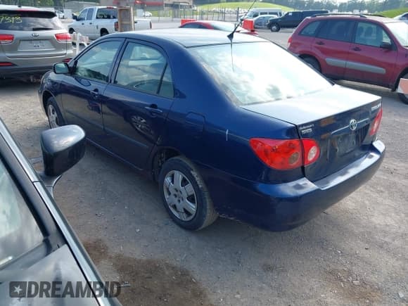 ✅ 2005 Toyota Corolla CE • VIN: 1NXBR32EX5Z358128 • Lot: 42451116. Listed on IAAI with 292,034 mi. Free auction sales archive from the USA and detailed vehicle history report at DreamBid. Image 3.
