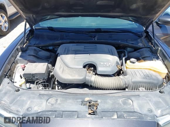 ✅ 2014 Dodge Charger SXT • VIN: 2C3CDXHG3EH339404 • Лот: 42072957. Опубликован ранее на IAAI с пробегом 125 183 миль. Бесплатный доступ к архиву аукционных продаж из США и подробный отчёт об истории автомобиля на DreamBid. Изображение 10.