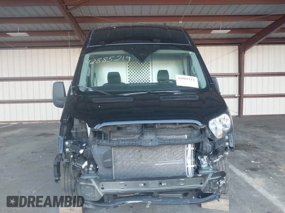 ✅ 2021 Ford Transit Cargo • VIN: 1FTBR3XG8MKA89703 • Lot: 42885214. Listed on IAAI with 79,907 mi. Free auction sales archive from the USA and detailed vehicle history report at DreamBid. Image 13.