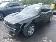 ✅ 2014 Infiniti Q50 • VIN: JN1BV7AP1EM677429 • Lot: 42656857. Listed on IAAI with 168,519 mi. Free auction sales archive from the USA and detailed vehicle history report at DreamBid. Image 19.