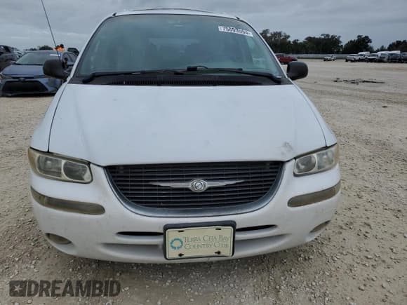 ✅ 1999 Chrysler Town & Country LXi • VIN: 1C4GP64L2XB779000 • Lot: 75893594. Listed on Copart with 109,619 mi. Free auction sales archive from the USA and detailed vehicle history report at DreamBid. Image 5.
