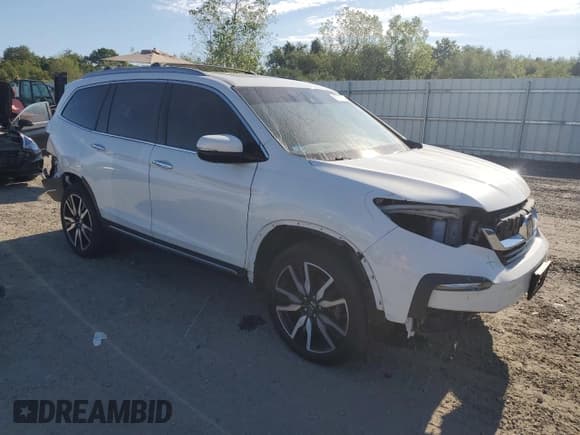 ✅ 2022 Honda Pilot Touring 7-Passenger • VIN: 5FNYF6H62NB007148 • Lot: 69777725. Listed on Copart with 54,748 mi. Free auction sales archive from the USA and detailed vehicle history report at DreamBid. Image 4.