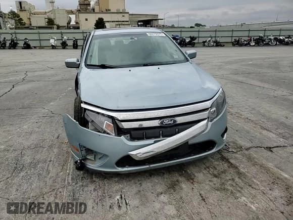 ✅ 2010 Ford Fusion Hybrid • VIN: 3FADP0L35AR345051 • Lot: 90279375. Wystawiony na Copart z przebiegiem 144 184 mil. Bezpłatny archiwum sprzedaży aukcyjnych z USA i szczegółowy raport historii pojazdu na DreamBid. Zdjęcie 13.