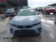 ✅ 2024 Honda Civic Sport Touring • VIN: 19XFL1G88RE011755 • Lot: 43459157. Listed on IAAI with 5,597 mi. Free auction sales archive from the USA and detailed vehicle history report at DreamBid. Image 12.