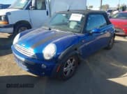 ✅ 2006 MINI Convertible • VIN: WMWRF33576TG14873 • Lot: 43592857. Listed on IAAI with 104,184 mi. Free auction sales archive from the USA and detailed vehicle history report at DreamBid. Image 2.