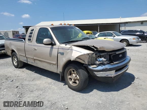 ✅ 1998 Ford F-150 XL • VIN: 1FTRX17LXWNC09671 • Lot: 69014494. Listed on Copart with 254,034 mi. Free auction sales archive from the USA and detailed vehicle history report at DreamBid. Image 4.