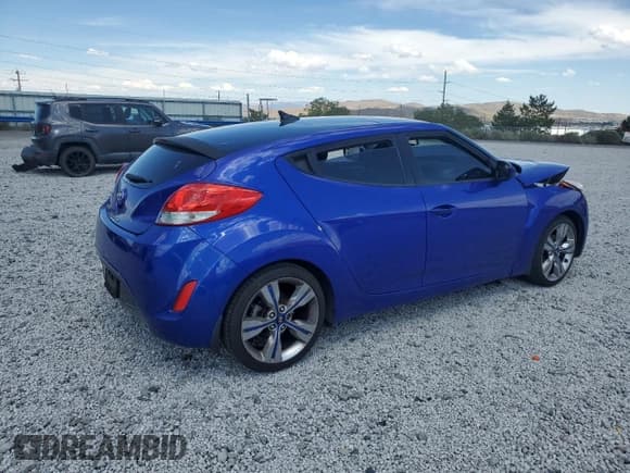 ✅ 2014 Hyundai Veloster • VIN: KMHTC6AD7EU209823 • Lot: 66675785. Listed on Copart with 104,123 mi. Free auction sales archive from the USA and detailed vehicle history report at DreamBid. Image 3.