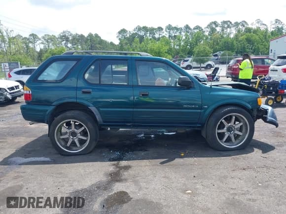 ✅ 1999 Isuzu Rodeo S • VIN: 4S2CK58W6X4332027 • Lot: 42087396. Listed on IAAI with 258,508 mi. Free auction sales archive from the USA and detailed vehicle history report at DreamBid. Image 12.