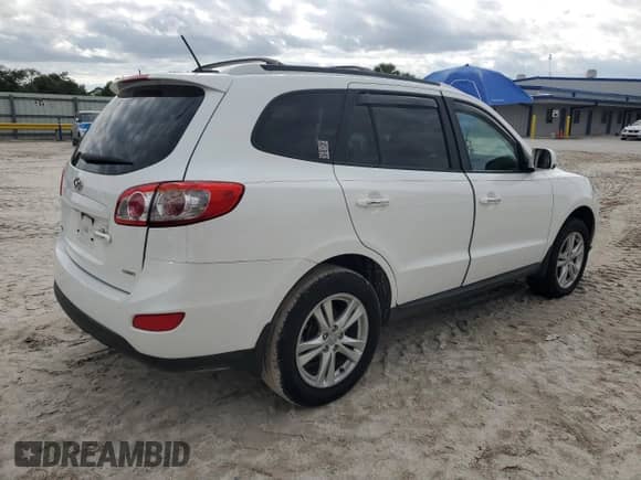 2012 Hyundai Santa Fe Limited z VIN 5XYZK4AG9CG103839, wystawiony jako Copart lot #90547425 z przebiegiem 65 297 mil mil oraz Szkoda całkowita • Salvage title. Historia ofert i sprzedaży dostępna na DreamBid. Obrazek 3.