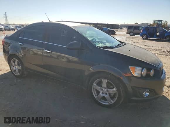 2014 Chevrolet Sonic LTZ с VIN 1G1JE5SG4E4126609, выставлен на аукционе Copart как лот 81645734 с пробегом 215 941 миль миль и Чистый • Clean title. История ставок и продаж доступна на DreamBid. Изображение 4.