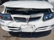 ✅ 2004 Pontiac Bonneville SE • VIN: 1G2HX52K14U176018 • Lot: 42691668. Wystawiony na IAAI z przebiegiem 185 274 mil. Bezpłatny archiwum sprzedaży aukcyjnych z USA i szczegółowy raport historii pojazdu na DreamBid. Zdjęcie 6.