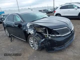 ✅ 2014 Lincoln MKS • VIN: 1LNHL9EK9EG601748 • Лот: 42133600. Опубликован ранее на IAAI с пробегом 136 128 миль. Бесплатный доступ к архиву аукционных продаж из США и подробный отчёт об истории автомобиля на DreamBid. Изображение 1.