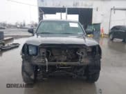 ✅ 2015 Toyota Tacoma • VIN: 5TFUU4EN8FX130349 • Lot: 43791926. Listed on IAAI with 139,141 mi. Free auction sales archive from the USA and detailed vehicle history report at DreamBid. Image 13.