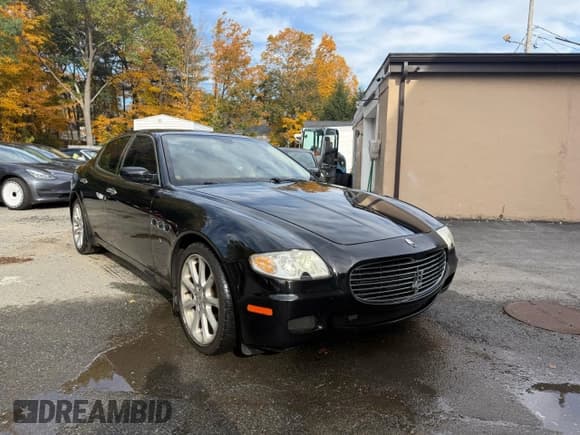 ✅ 2005 Maserati Quattroporte • VIN: ZAMCE39A450018466 • Lot: 90034455. Wystawiony na Copart z przebiegiem 97 331 mil. Bezpłatny archiwum sprzedaży aukcyjnych z USA i szczegółowy raport historii pojazdu na DreamBid. Zdjęcie 1.