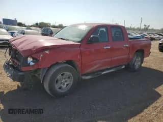 2005 Dodge Dakota SLT with VIN 1D7HW48N15S273409, listed as a Copart auction lot 84817255 with Not provided miles and Salvage title. Bid and sale history available at DreamBid. Image 1.