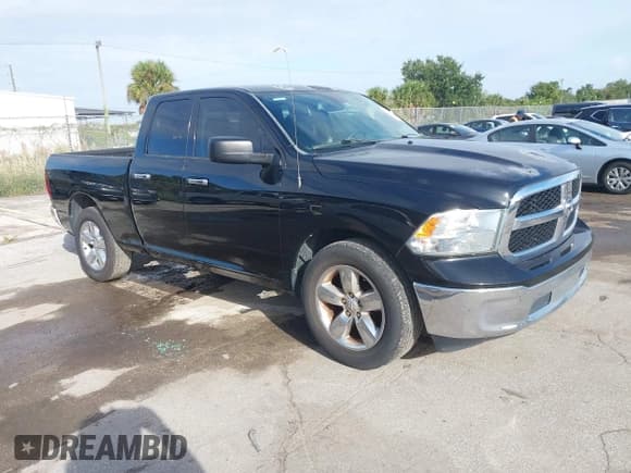 ✅ 2015 Ram 1500 SLT • VIN: 1C6RR6GG4FS529751 • Lot: 43349323. Listed on IAAI with 163,123 mi. Free auction sales archive from the USA and detailed vehicle history report at DreamBid. Image 1.