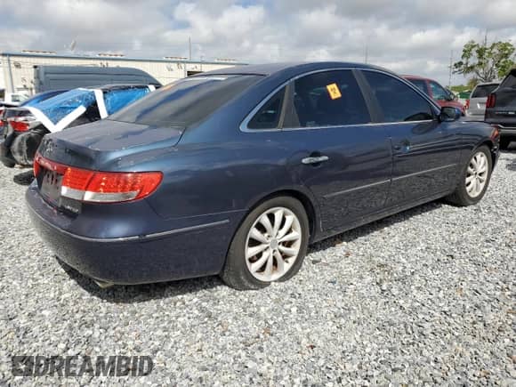 2006 Hyundai Azera SE с VIN KMHFC46F36A129241, выставлен на аукционе Copart как лот 51295615 с пробегом Не указан миль и Списание • Salvage title. История ставок и продаж доступна на DreamBid. Изображение 3.