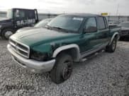 ✅ 2004 Dodge Dakota SLT • VIN: 1D7HG48N34S525558 • Lot: 77892794. Wystawiony na Copart z przebiegiem 206 341 mil. Bezpłatny archiwum sprzedaży aukcyjnych z USA i szczegółowy raport historii pojazdu na DreamBid. Zdjęcie 1.