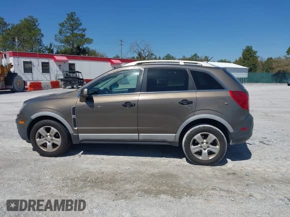 ✅ 2014 Chevrolet Captiva Sport LS • VIN: 3GNAL2EK1ES575989 • Lot: 41757007. Wystawiony na IAAI z przebiegiem 105 190 mil. Bezpłatny archiwum sprzedaży aukcyjnych z USA i szczegółowy raport historii pojazdu na DreamBid. Zdjęcie 14.