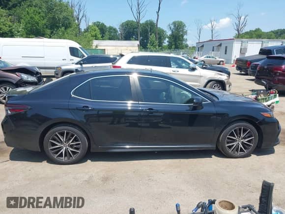 2021 Toyota Camry SE with VIN 4T1G11BK6MU036852, listed as a IAAI auction lot 42590115 with 79,752 mi miles and . Bid and sale history available at DreamBid. Image 13.