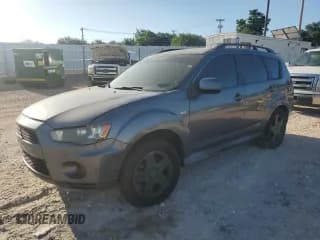 ✅ 2011 Mitsubishi Outlander ES • VIN: JA4AS2AW5BU032624 • Lot: 66719005. Listed on Copart with 140,509 mi. Free auction sales archive from the USA and detailed vehicle history report at DreamBid. Image 1.