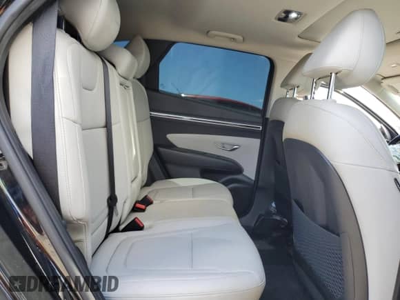 2023 Hyundai Tucson SEL with VIN 5NMJFCAE9PH266593, listed as a Copart auction lot 70394515 with 27,112 mi miles and Salvage title. Bid and sale history available at DreamBid. Image 11.