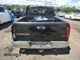 2003 Dodge 1500 ST z VIN 1D7HA18D93S365109, wystawiony jako Copart lot #69326694 z przebiegiem 229 839 mil mil oraz Szkoda całkowita • Salvage title. Historia ofert i sprzedaży dostępna na DreamBid. Obrazek 6.