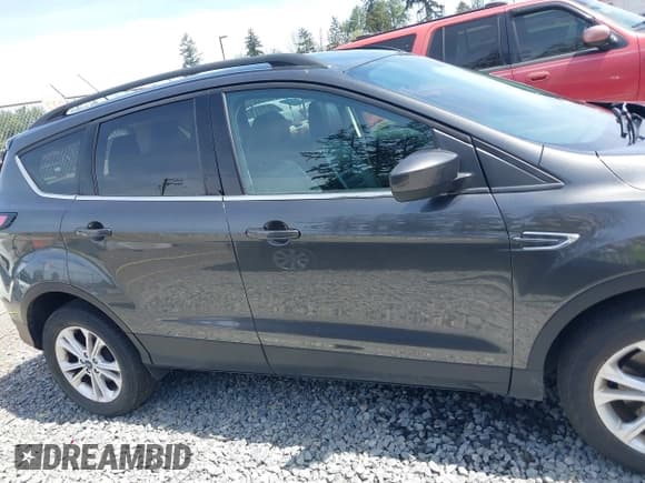 ✅ 2017 Ford Escape SE • VIN: 1FMCU9G99HUE48621 • Lot: 42171602. Wystawiony na IAAI z przebiegiem 95 179 mil. Bezpłatny archiwum sprzedaży aukcyjnych z USA i szczegółowy raport historii pojazdu na DreamBid. Zdjęcie 14.