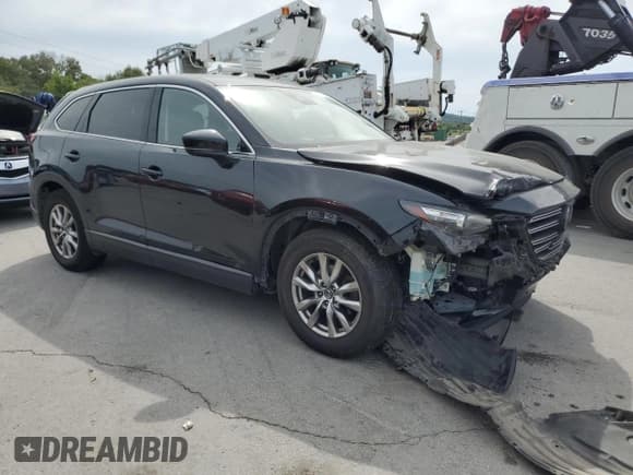 ✅ 2019 Mazda CX-9 Touring • VIN: JM3TCACY8K0302187 • Lot: 70201395. Listed on Copart with 142,477 mi. Free auction sales archive from the USA and detailed vehicle history report at DreamBid. Image 4.