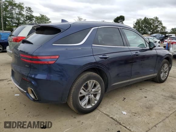 ✅ 2022 Genesis GV70 2.5T • VIN: KMUMADTB6NU065144 • Лот: 80808725. Опубликован ранее на Copart с пробегом 54 210 миль. Бесплатный доступ к архиву аукционных продаж из США и подробный отчёт об истории автомобиля на DreamBid. Изображение 3.