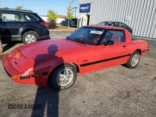 ✅ 1985 Mazda RX-7 • VIN: JM1FB3311F0858774 • Lot: 72128824. Wystawiony na Copart z przebiegiem 100 018 mil. Bezpłatny archiwum sprzedaży aukcyjnych z USA i szczegółowy raport historii pojazdu na DreamBid. Zdjęcie 1.