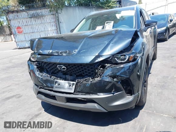 ✅ 2025 Mazda CX-50 Hybrid Preferred Package • VIN: 7MMVAABW6SN121230 • Lot: 42934600. Listed on IAAI with 2,880 mi. Free auction sales archive from the USA and detailed vehicle history report at DreamBid. Image 12.